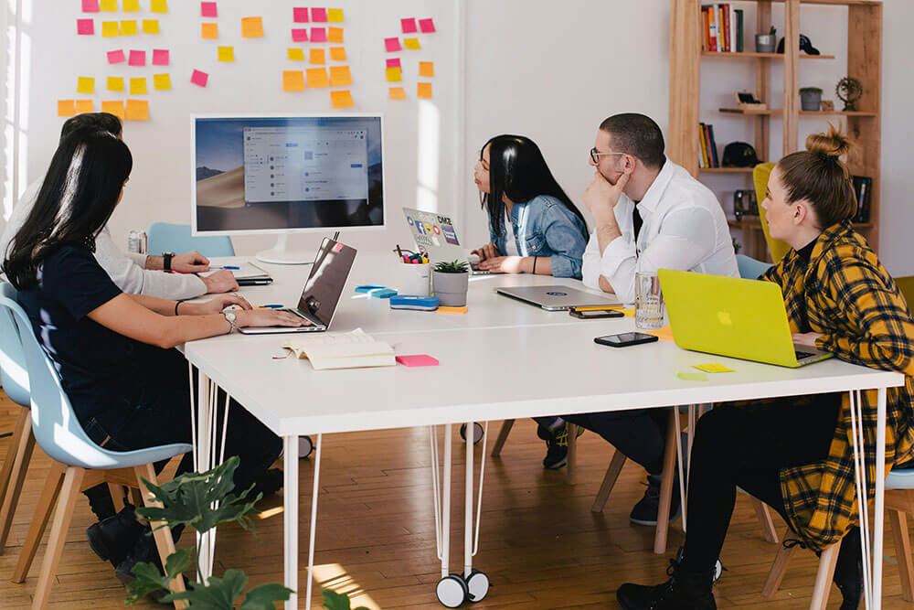 Employees having a meeting