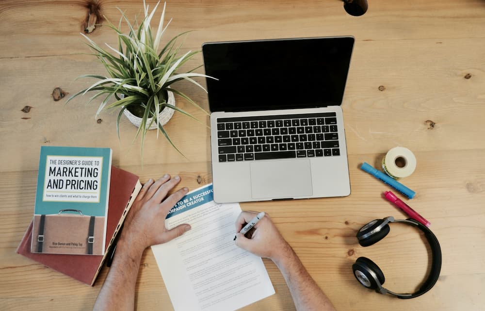 Workspace with books and a laptop